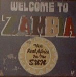 [Bord: Welcome to Zambia - The real Africa in the Sun]